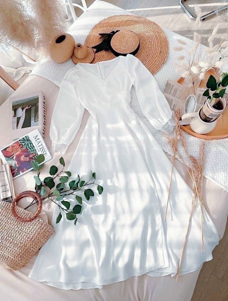 Đầm trắng viền ren nút eo