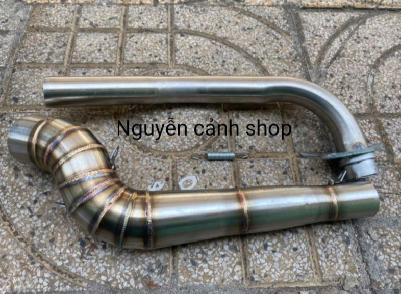 Wave Car Exhaust Pipe Is Small and Has 2 Pieces Attached to the Exhaust Can.