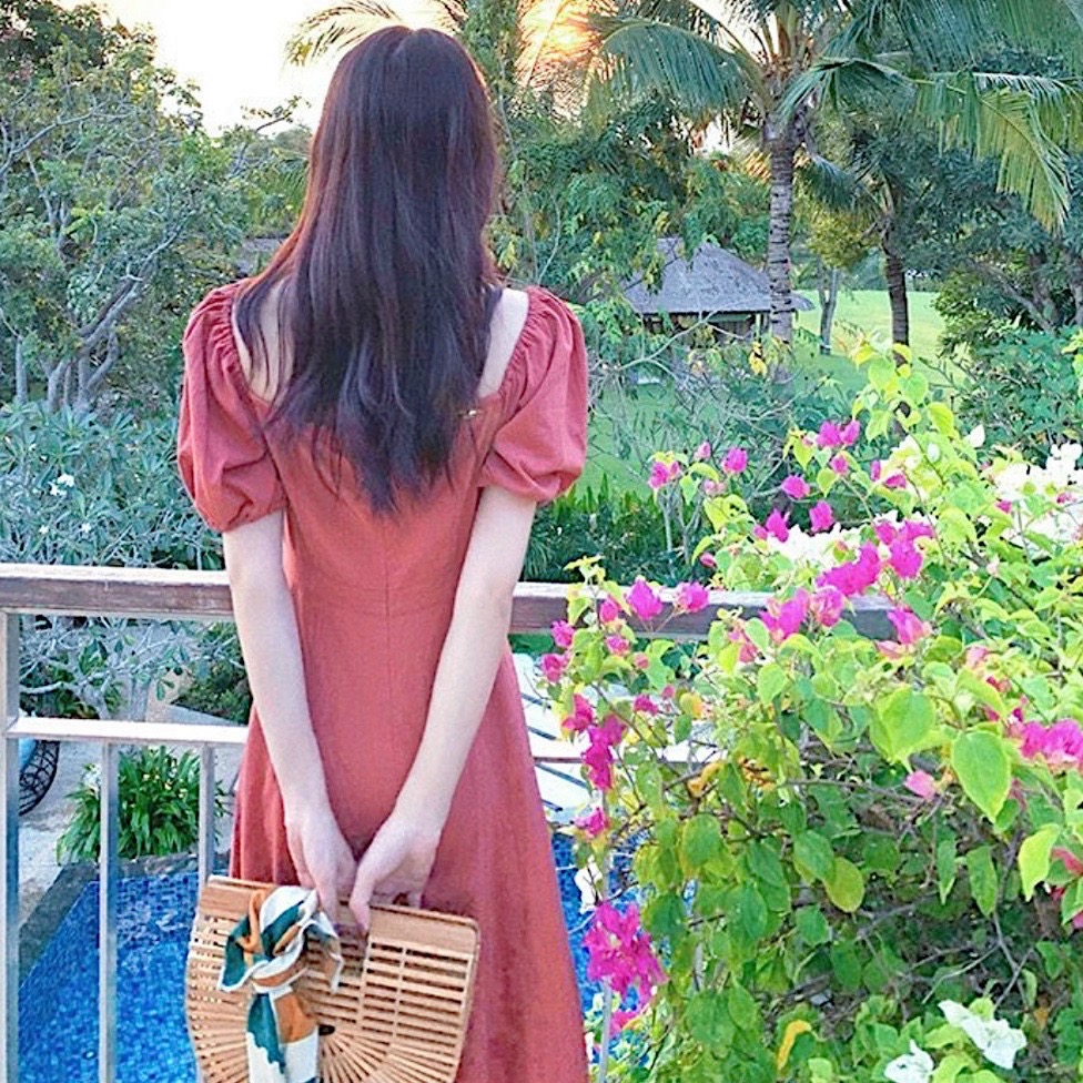 Đầm hồng ruốc tay bo form dài