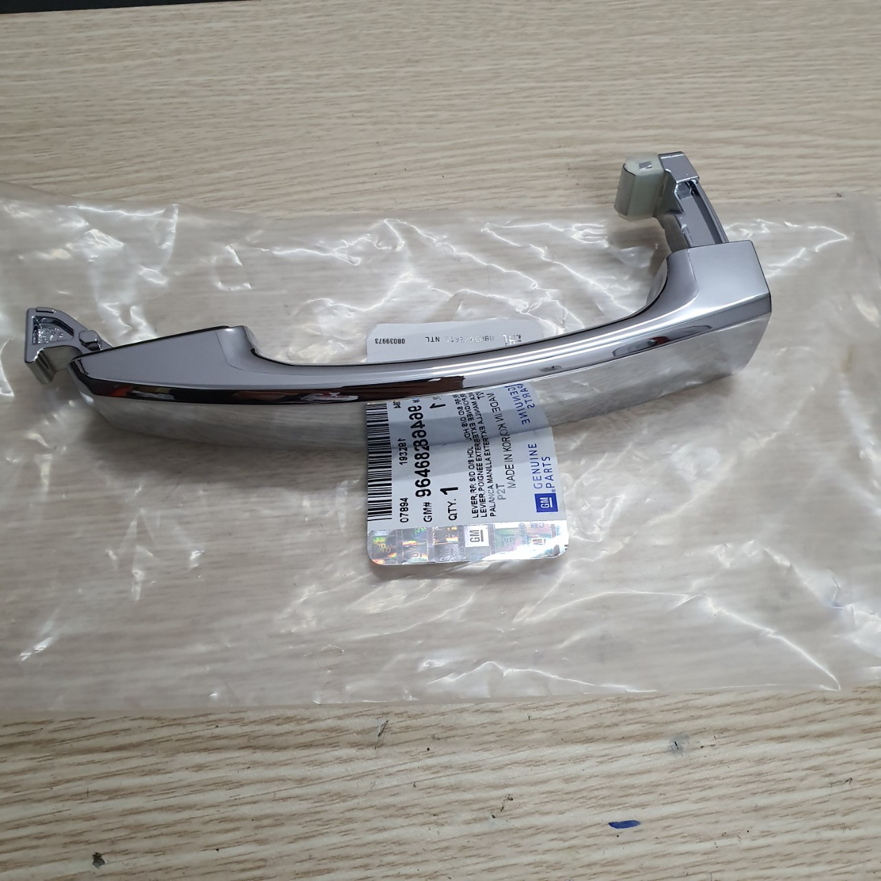 Tay mở cửa ngoài Gentra