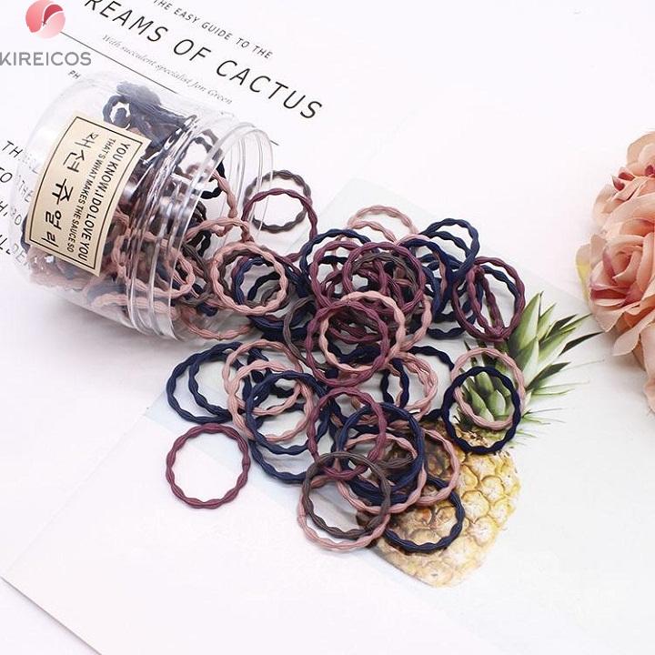 Hộp 100 sợi dây cột tóc buộc tóc trơn loại nhỏ nhiều màu