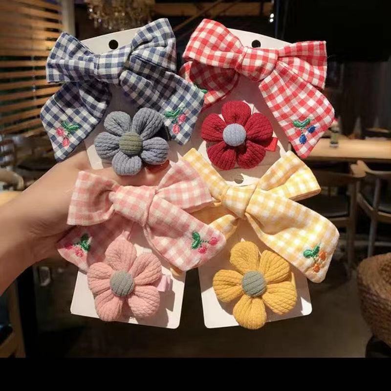 Sét 2 kẹp nơ và bông dễ thương cho bé gái