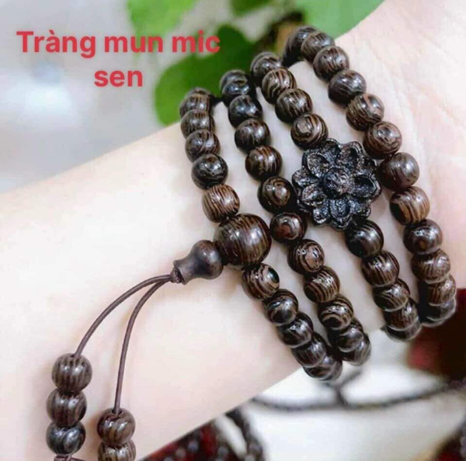 Chuỗi 108 hạt gỗ Mun đen vân đuôi công cực đẹp
