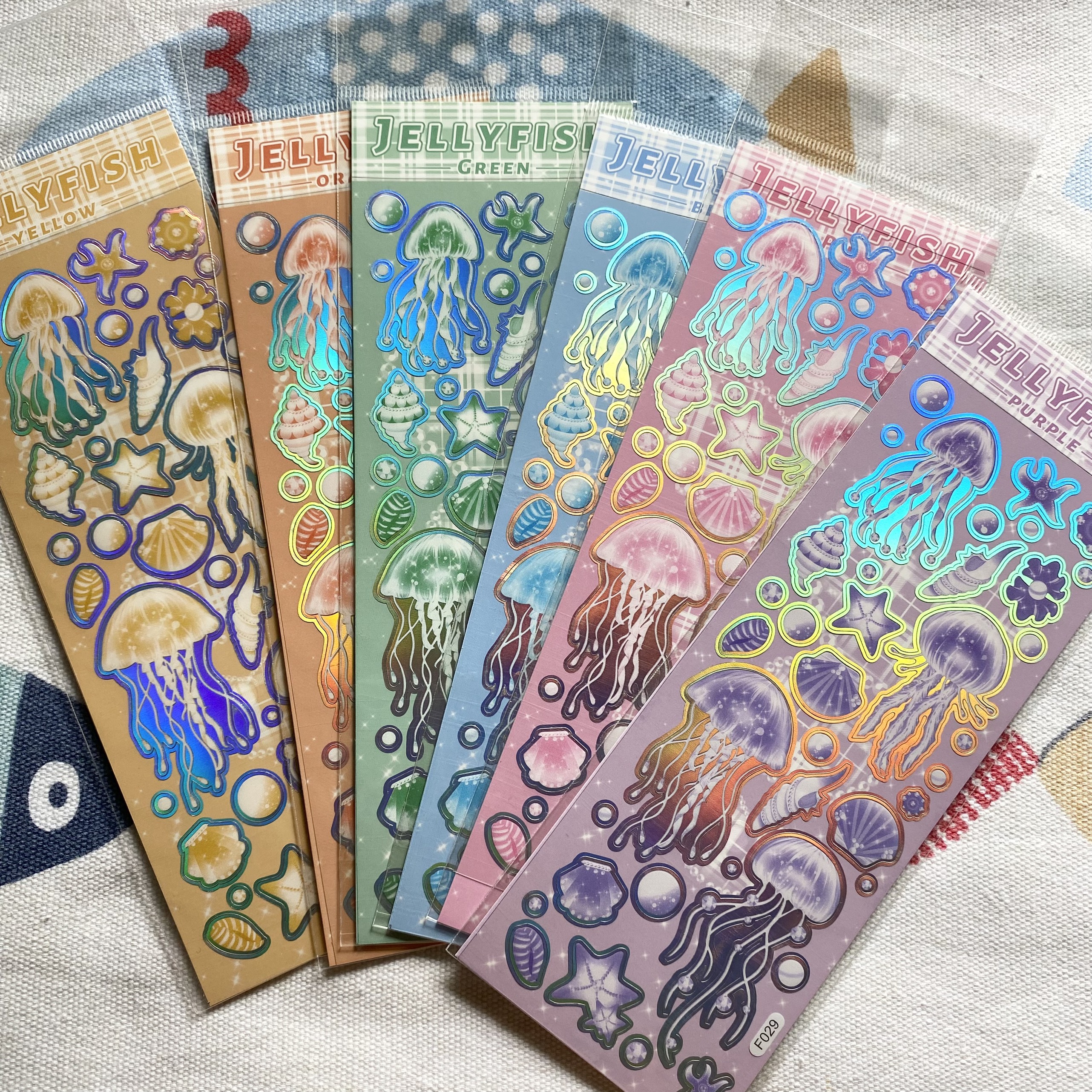 Sticker sứa trang trí toploader