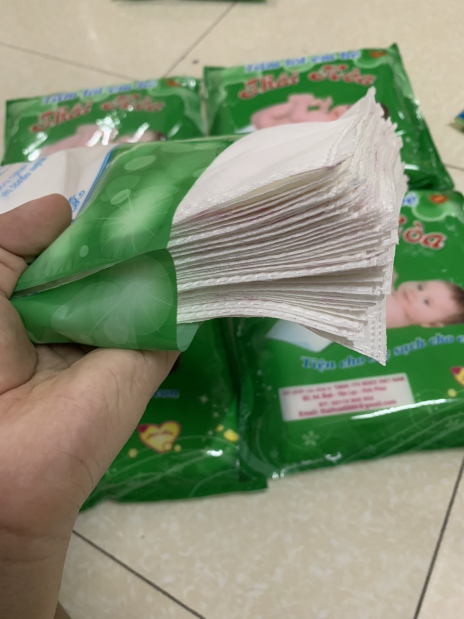 Tấm lót phân su sơ sinh 3 lớp Thái Hòa (200gram - 35 tờ)