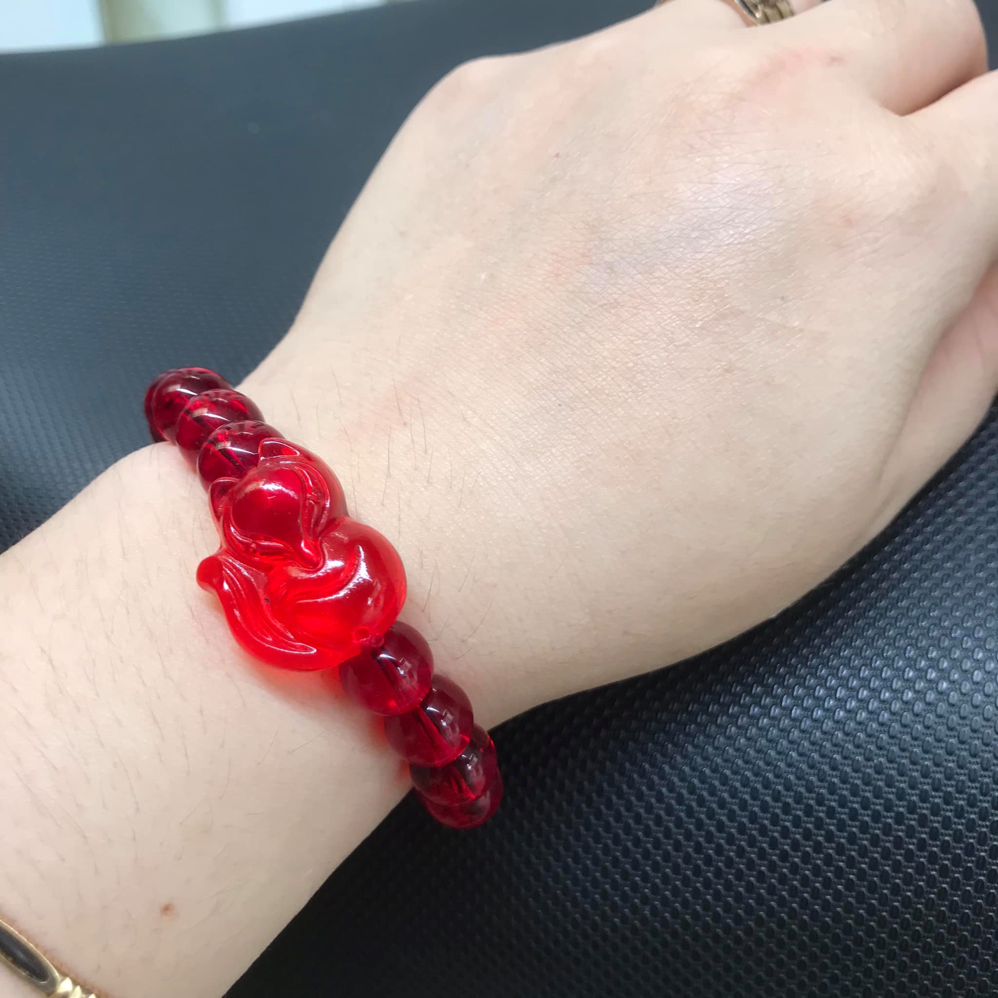 VÒNG TAY HỒ LY ĐÁ POLY ĐỎ