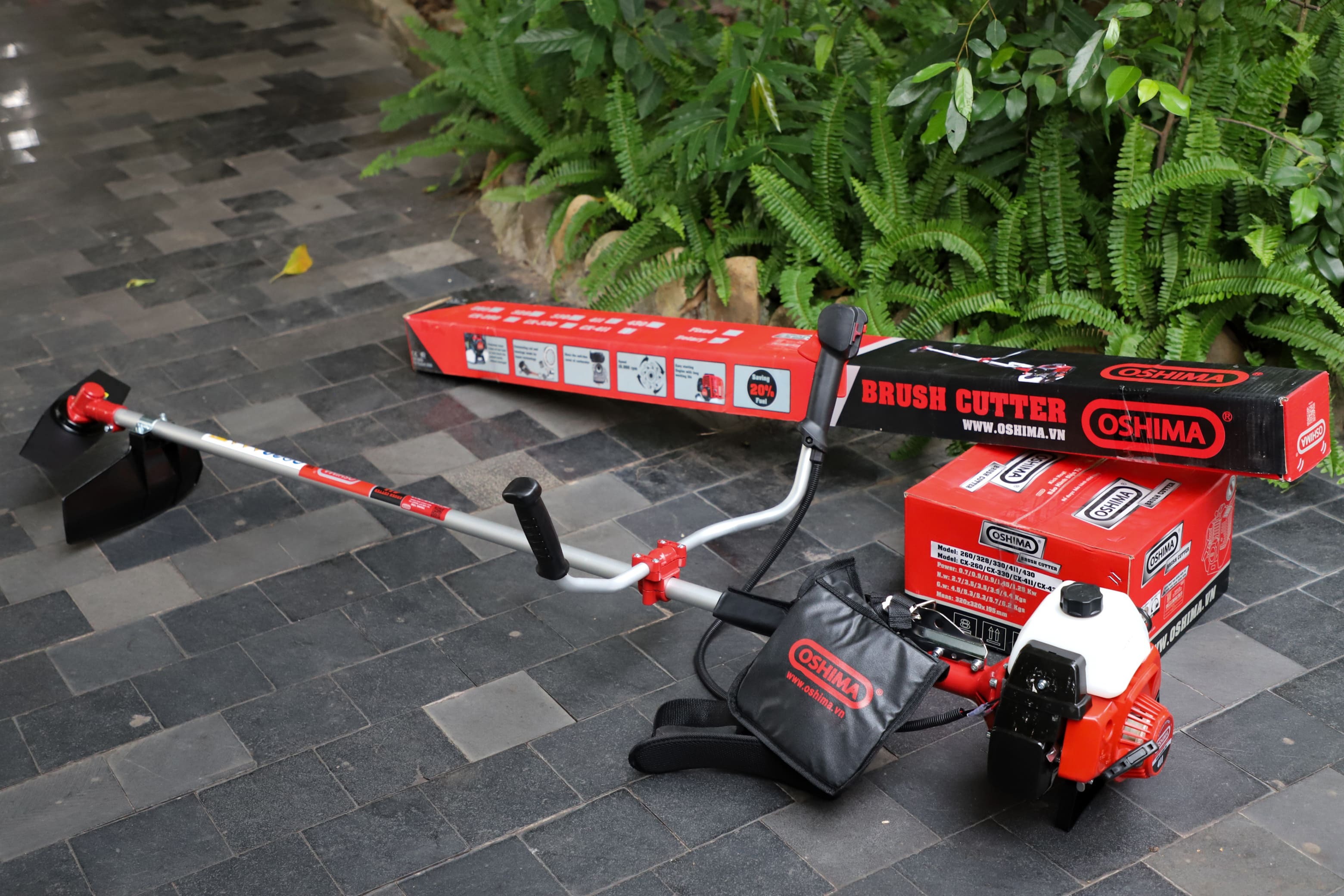 MÁY CẮT CỎ OSHIMA 411 BẠC (Máy mới 100% trọn bộ đầy đủ phụ kiện 2 thì đeo vai).