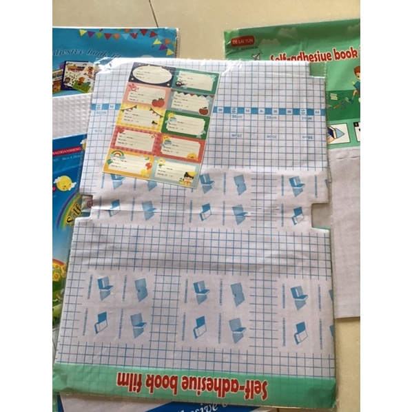 Bọc sách vở decal các cấp, bìa decan bọc sách