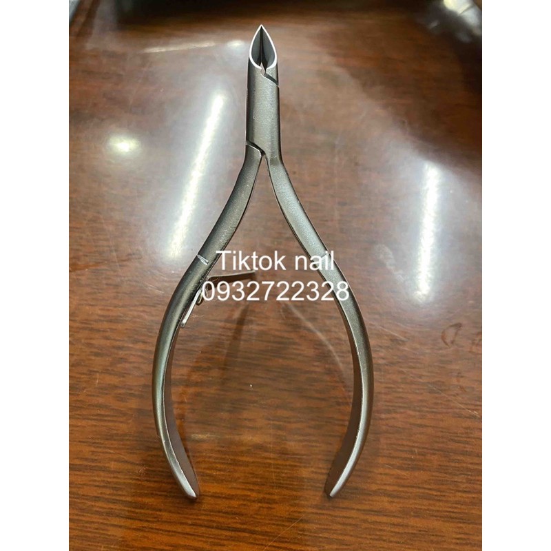Kiềm Cắt Da màu bạc TTN