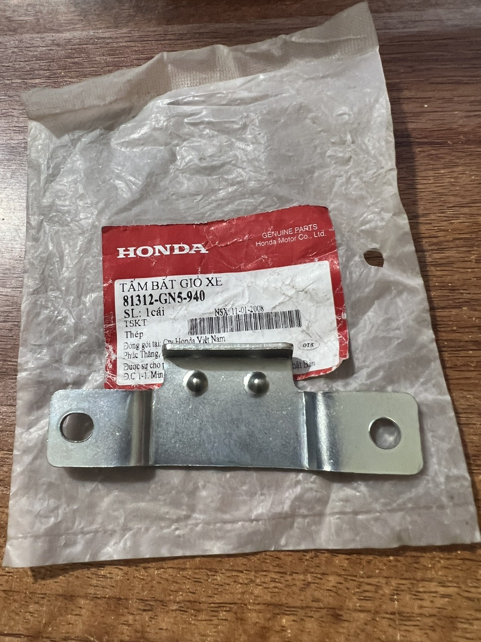Tấm bắt giỏ xe dream honda