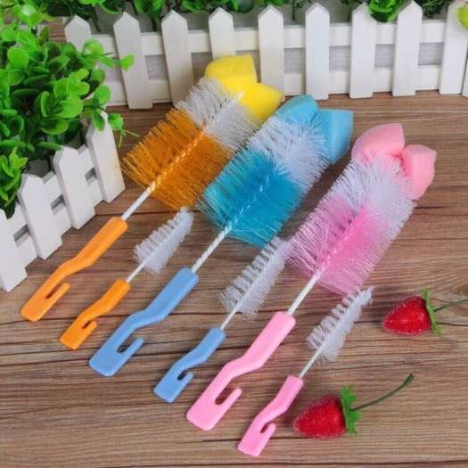 cây cọ rửa bình sữa và núm ti