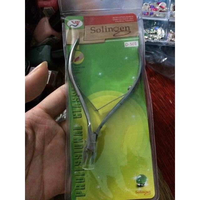 kìm nhặt da chết