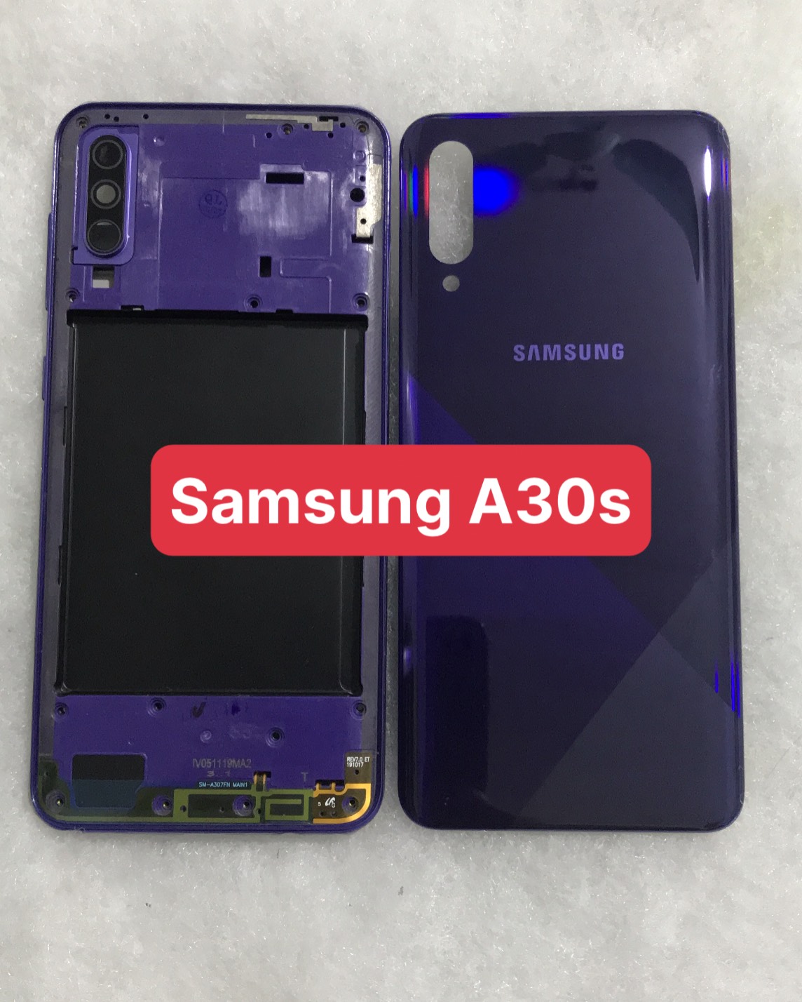 Bộ vỏ sườn  Samsung A30s zin (bộ gồm lưng, sườn, phím bấm, kính camera)