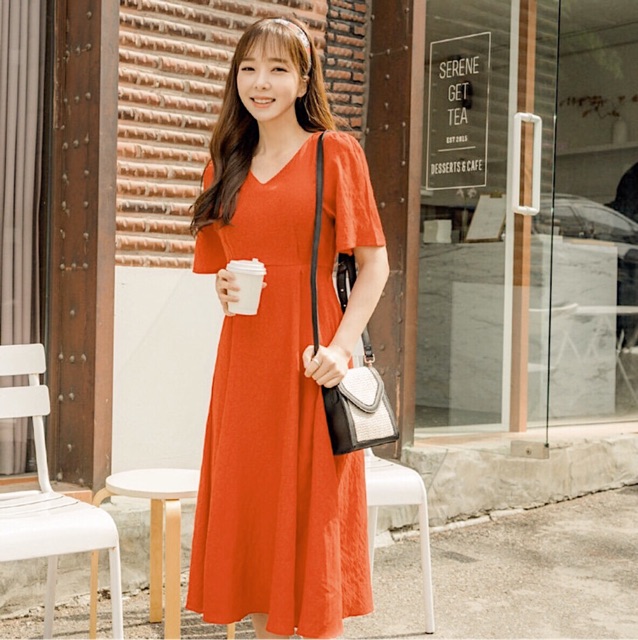 Đầm cam cổ V form dài thắt nơ