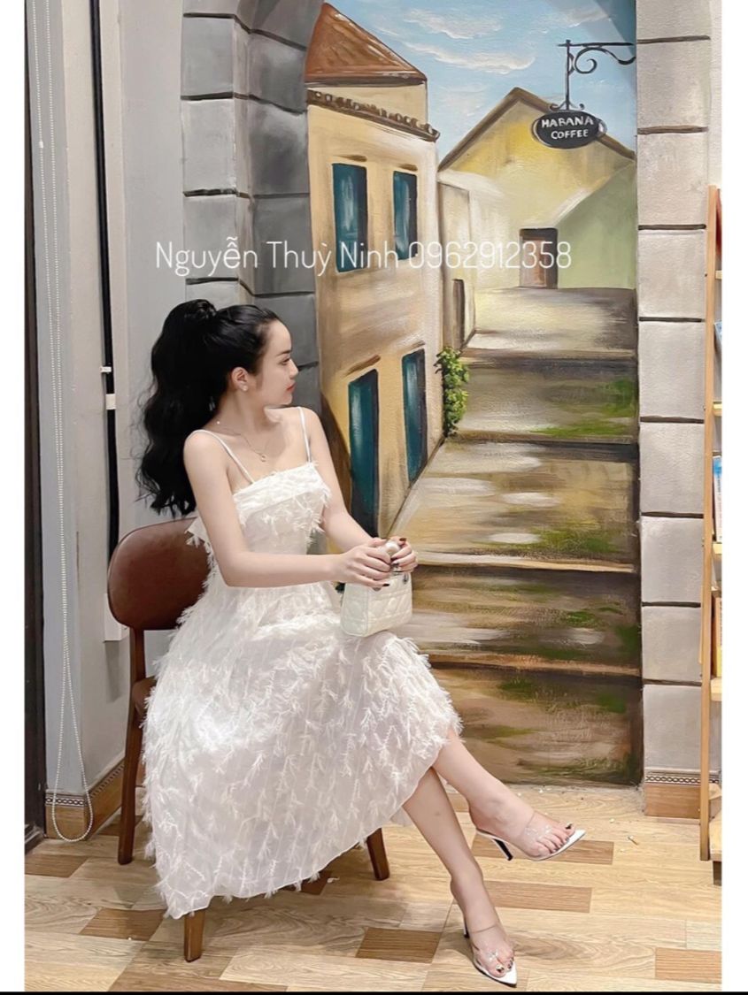 Đầm thiết kế hai dây lông vũ kiêu sa cao cấp