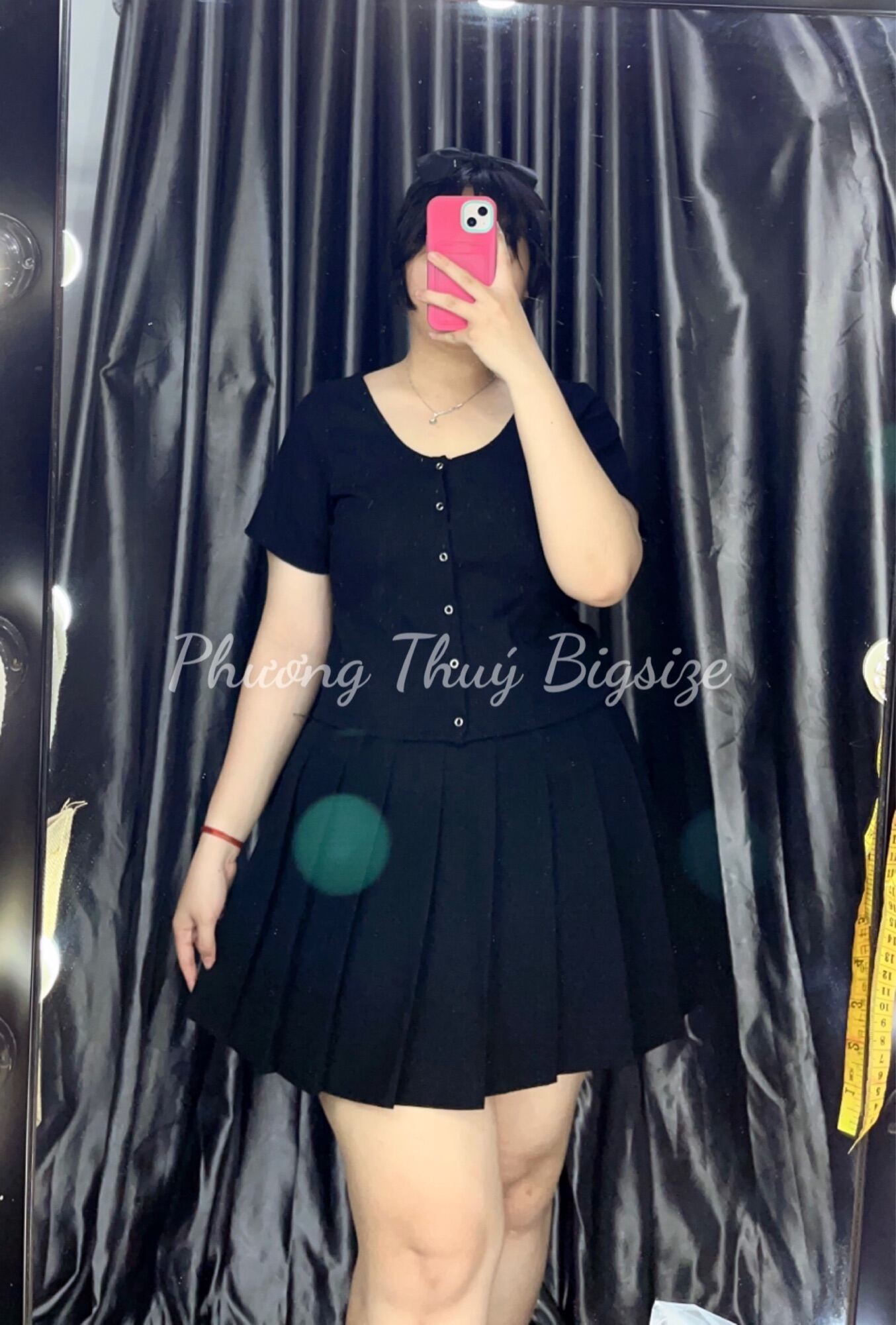 Áo thun cúc bấm nữ bigsize (Ảnh mẫu chụp tại shop).