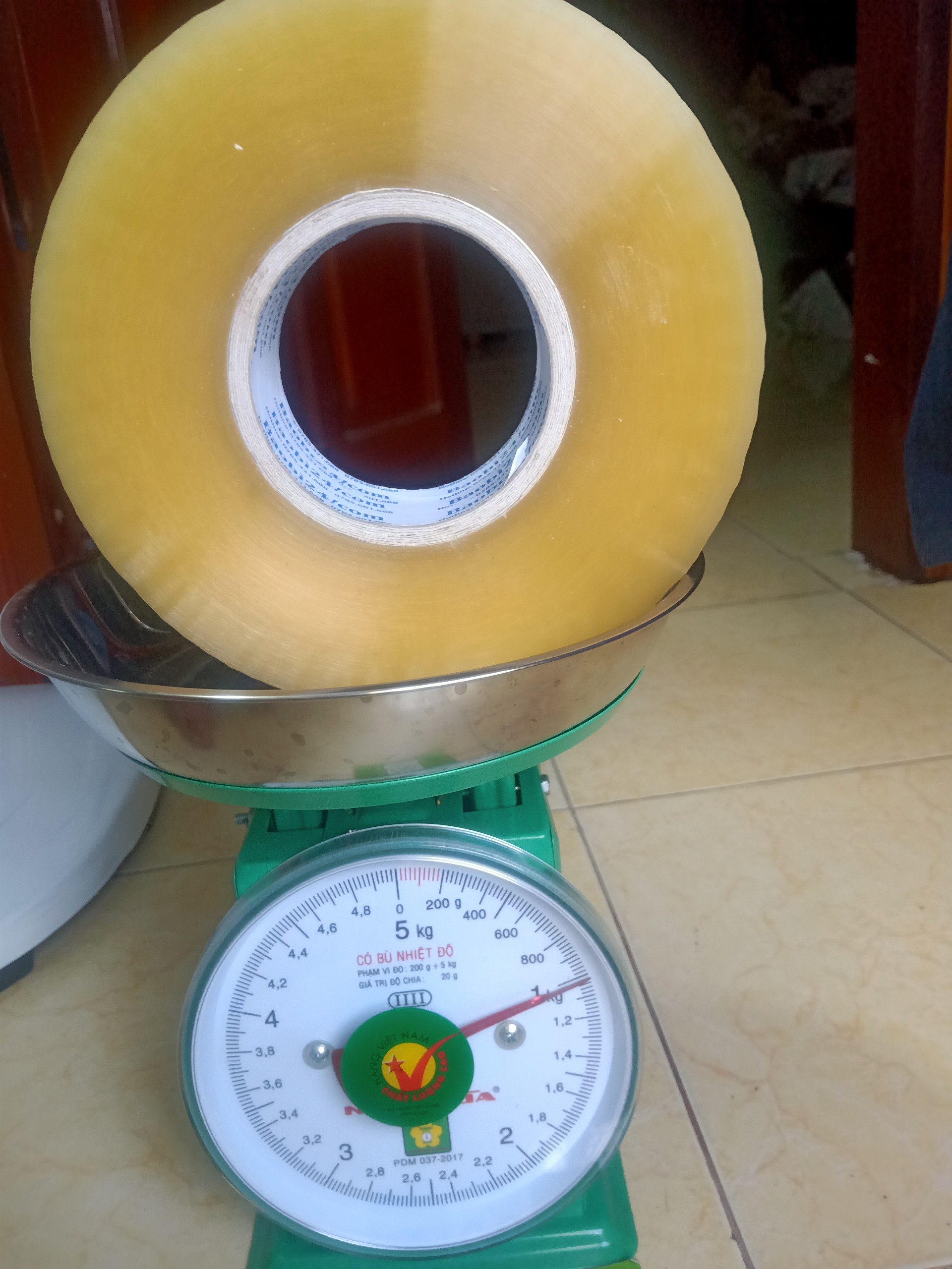 Bán băng dính cuộn to 1kg lõi mỏng