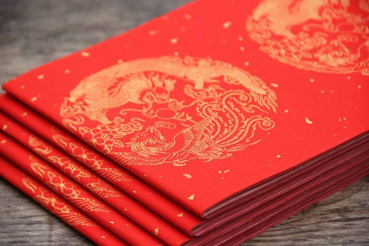 Giấy xuyến liễn đỏ viết câu đối ngày Tết