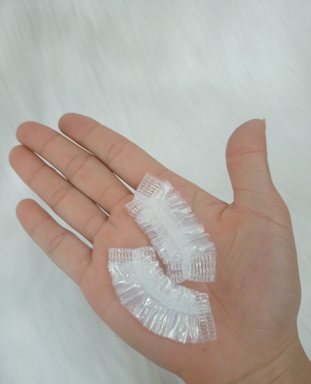 1 Bịch 100 chụp tai ni lông