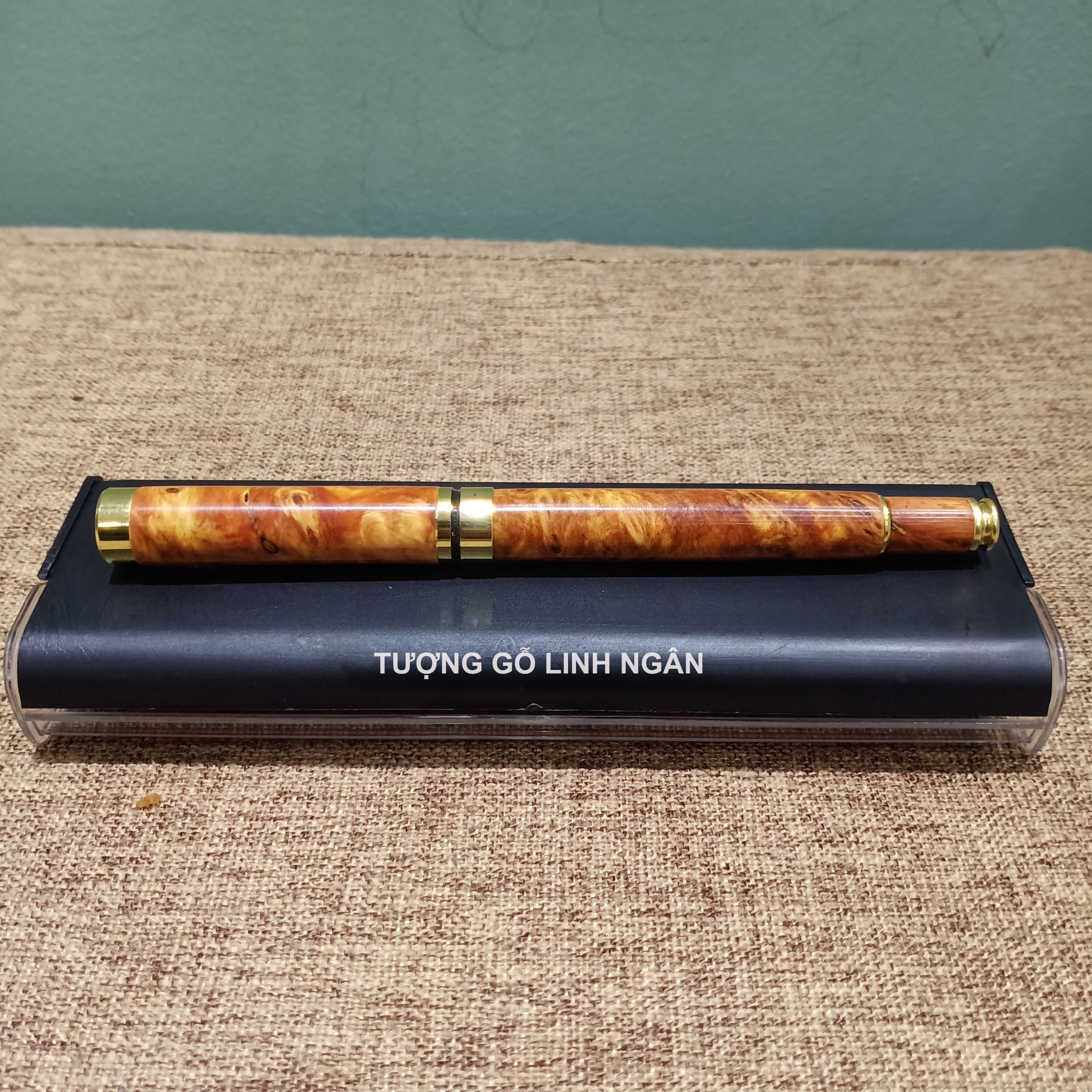 Bút ký gỗ Nu huyết long