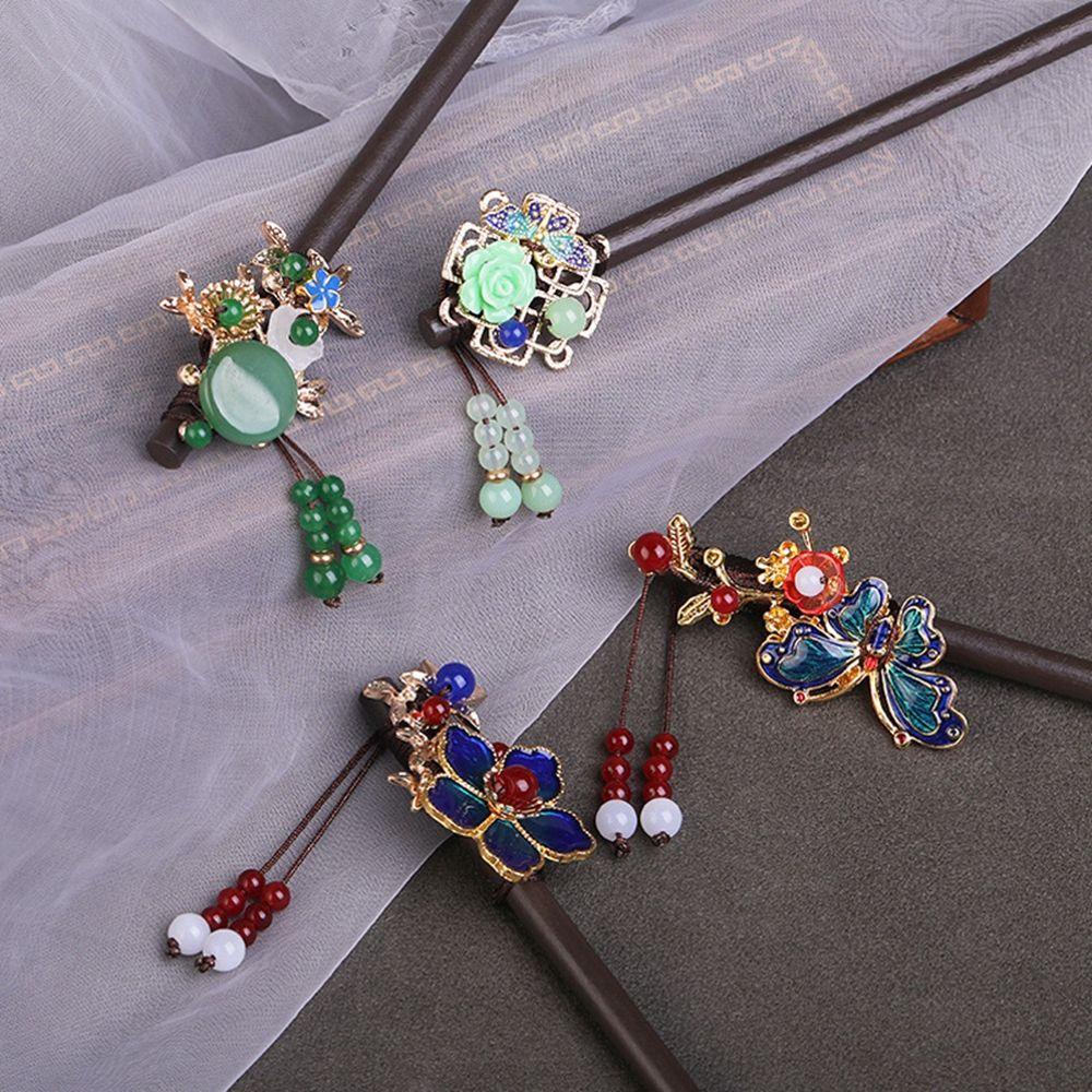 TRÂM BÚI TÓC CỔ PHONG GỖ