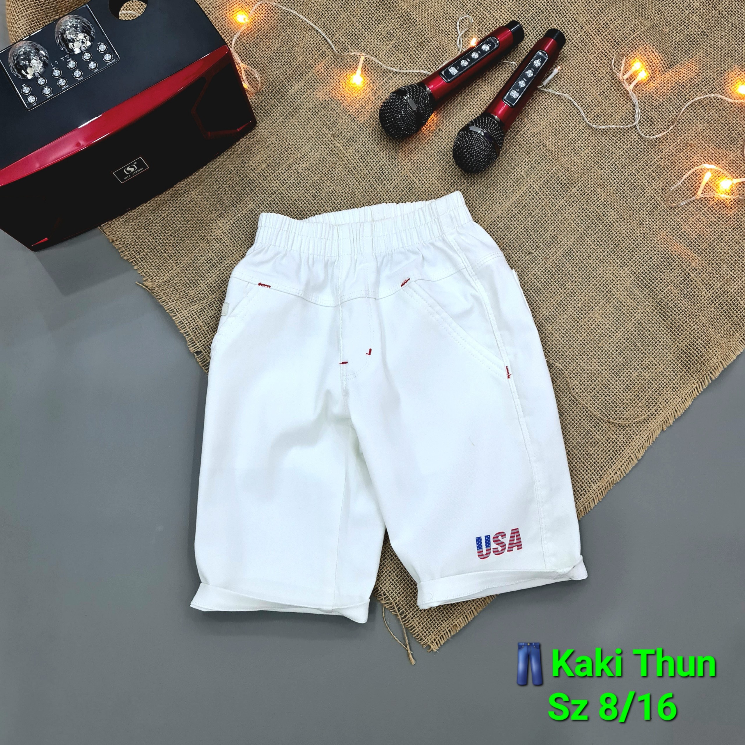 Quần short kaki trắng chữ USA