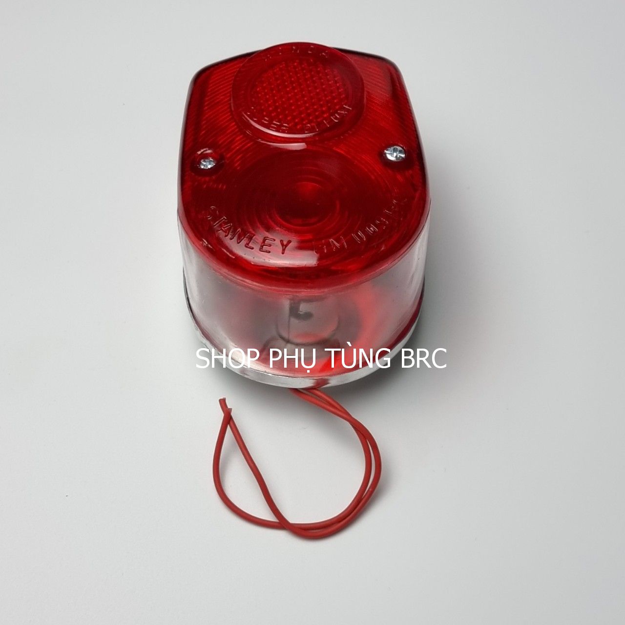 Bộ đèn hậu xe CUB 81 ( chụp đèn màu đỏ không kèm bóng đèn)