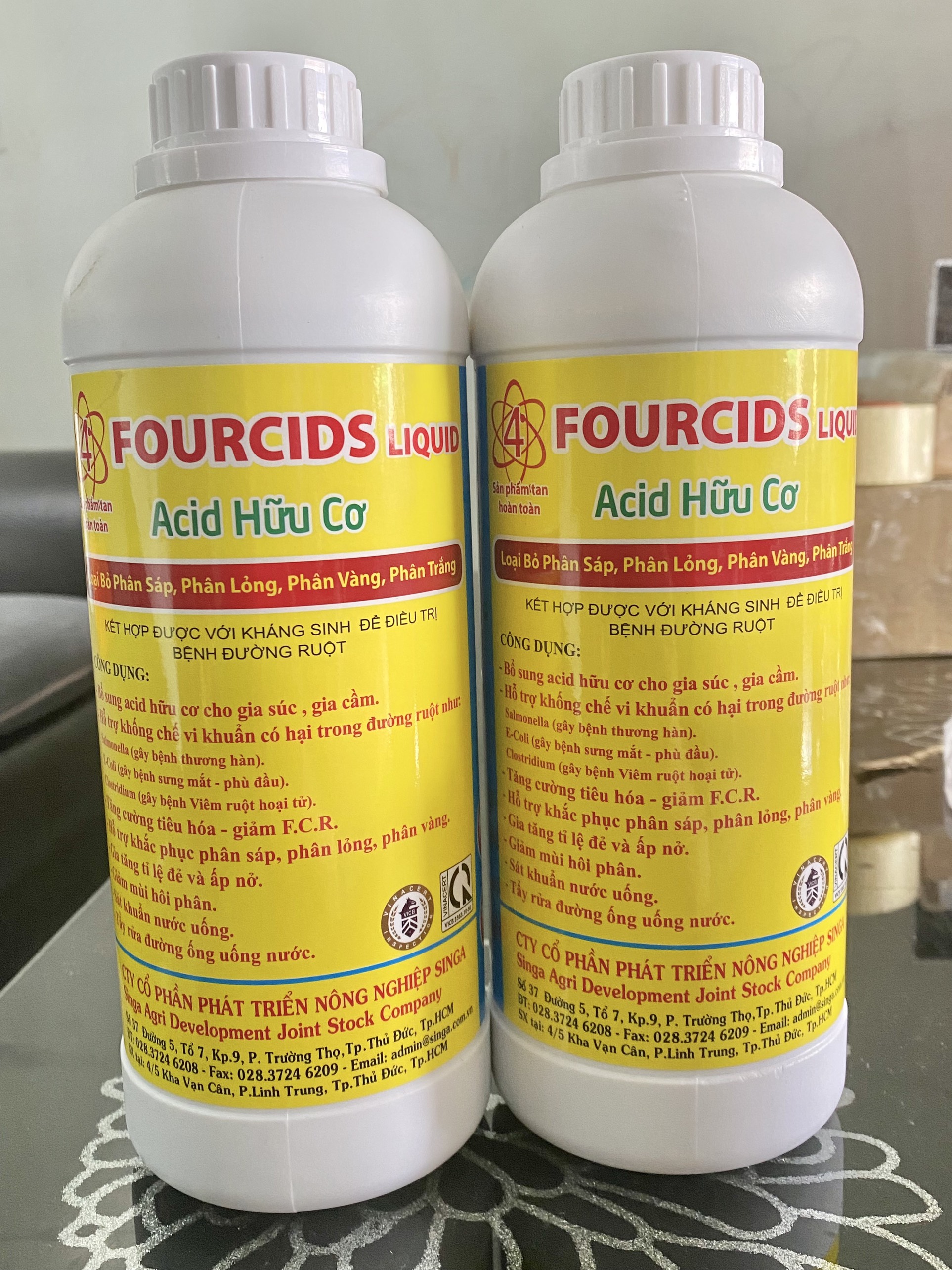 Fourcids Liquid Acid hữu cơ (chai 1 lít) loại bỏ phân sáp, phân lỏng, phân vàng, phân trắng