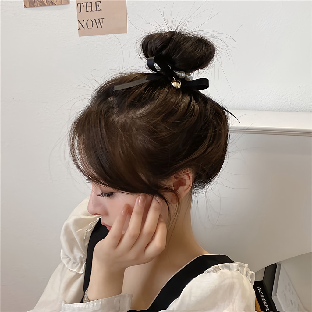 Cột tóc dạng chuỗi hạt ngọc trai phối nơ phong cách tiểu thư