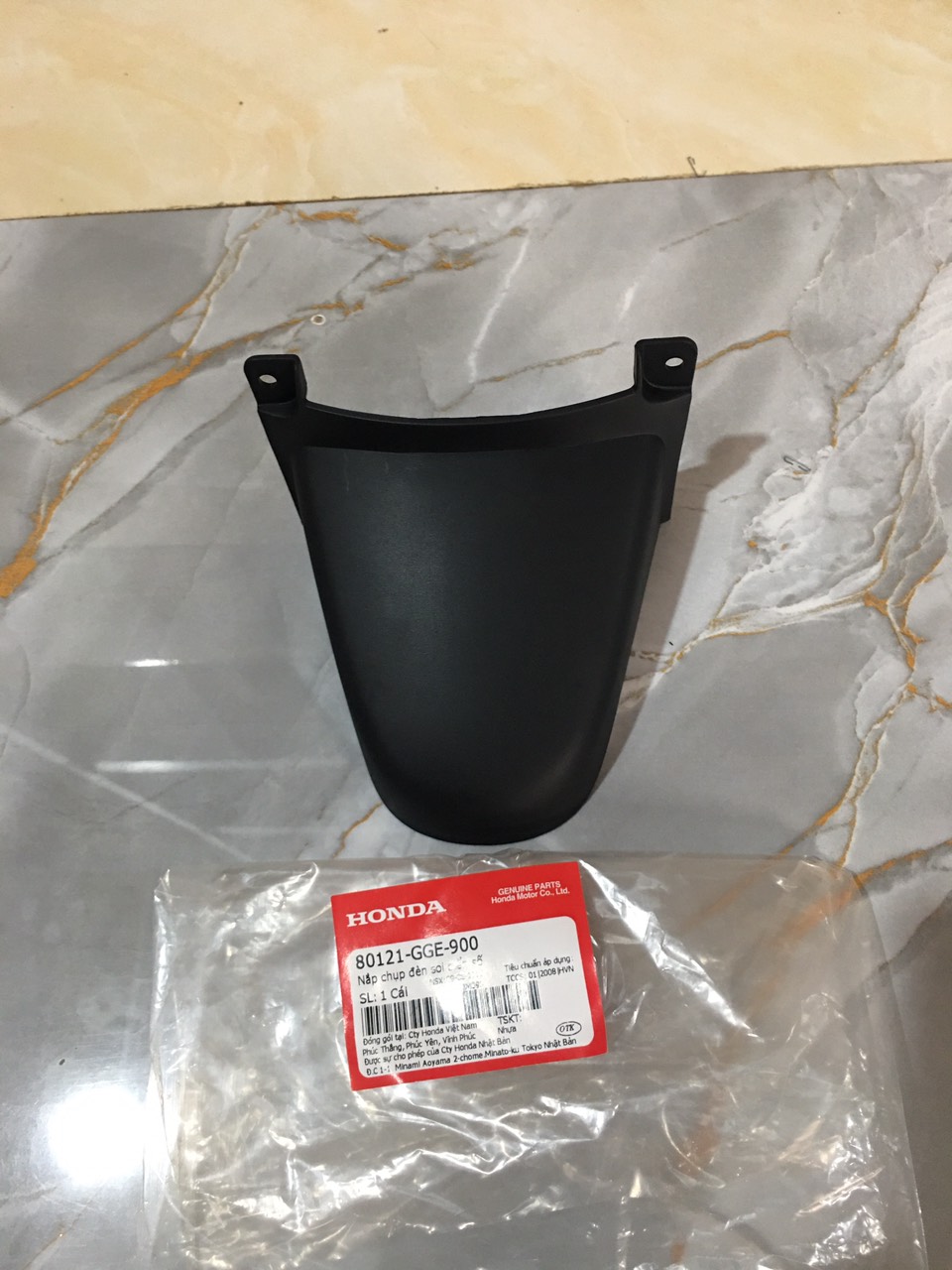 Nắp chụp đèn soi biển số LEAD 110 (80121GGE900)