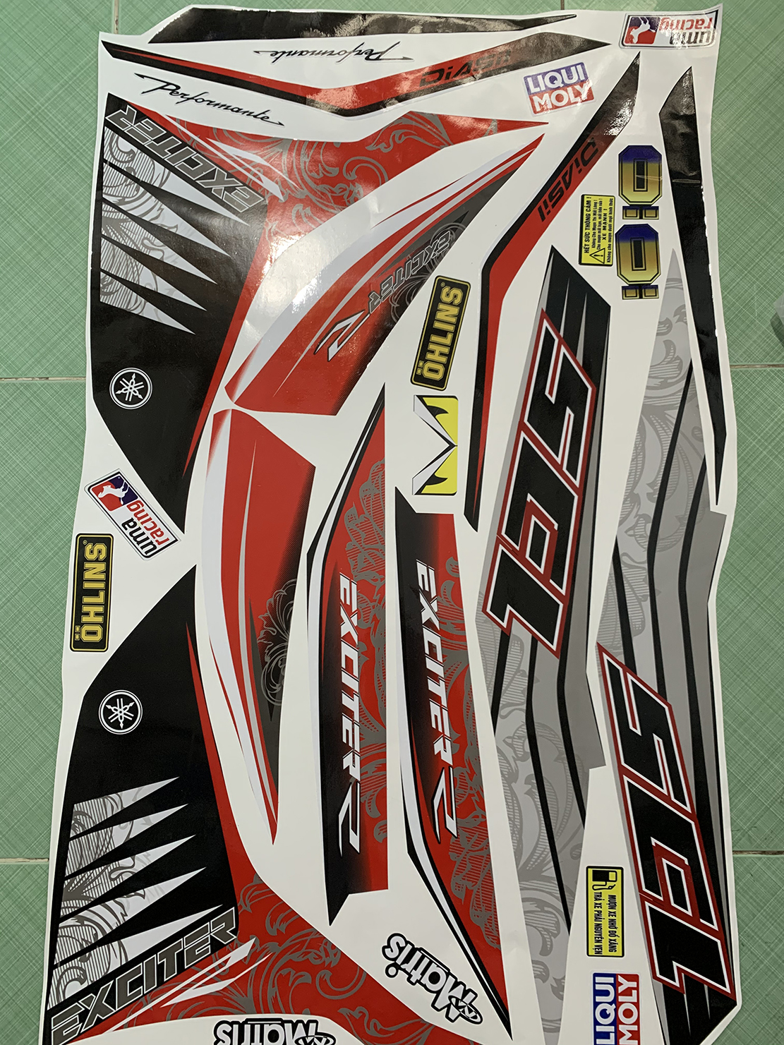 Tem exciter 135 đỏ đen r
