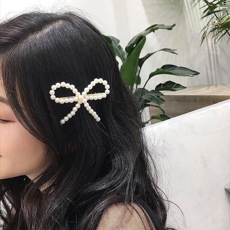 Kẹp tóc ngọc trai hình nơ