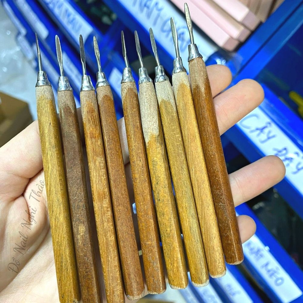 Cây lấy khóe móng chân cán gỗ