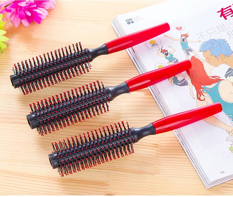 Lược tròn chải tóc uốn cán đen
