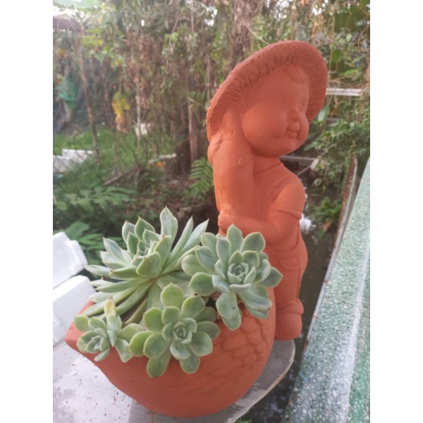 Chậu đất nung hình bé ôm vịt