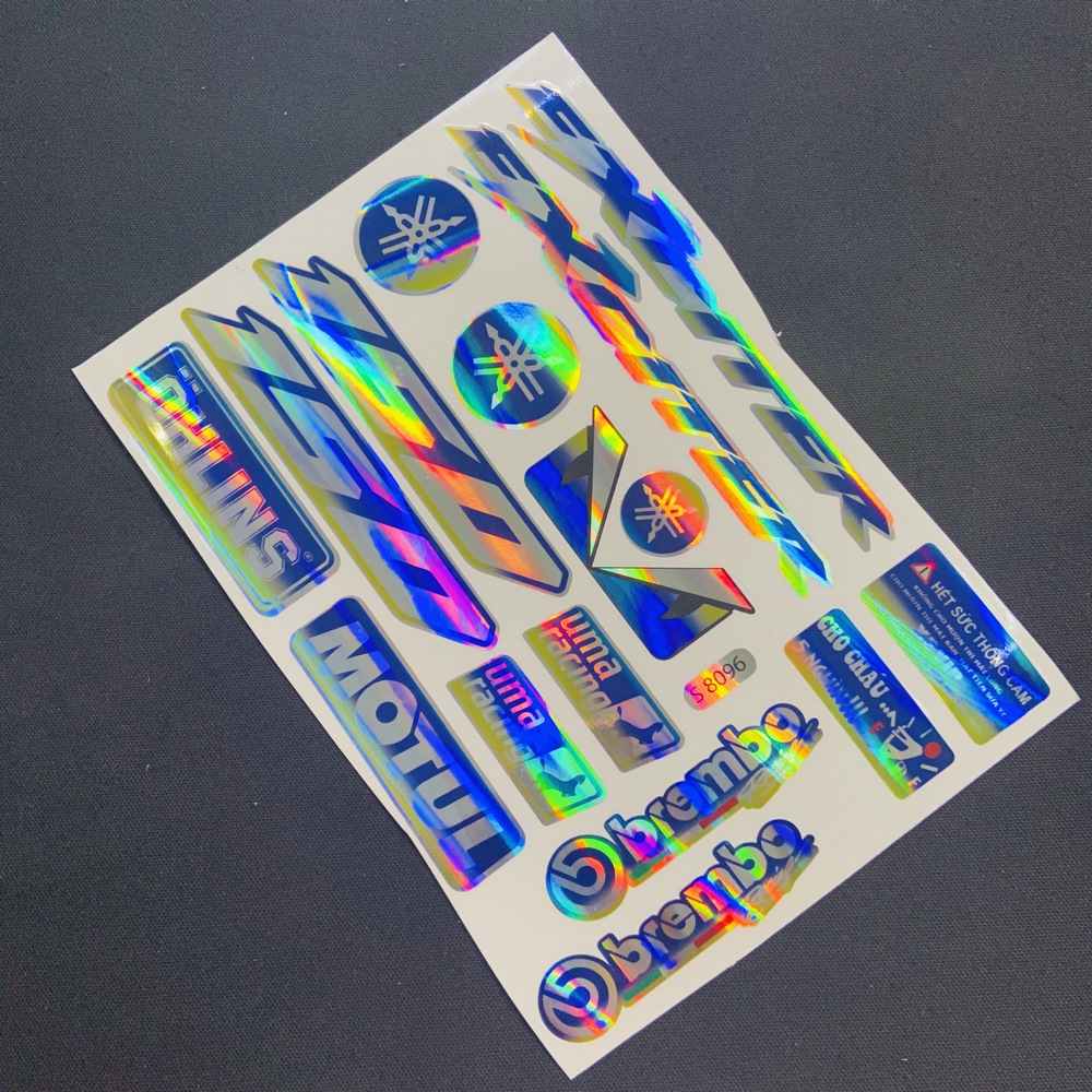 TEM LOGO MẠ CROM TRANG TRÍ XE EXCITER 150 (DẠ QUANG)