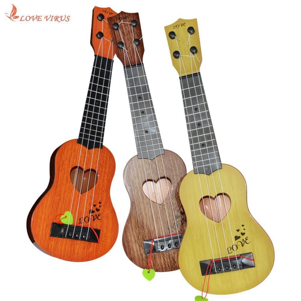 ĐỒ CHƠI ĐÀN GUITAR MINI GIẢ GỖ CHO BÉ TẬP ĐÁNH