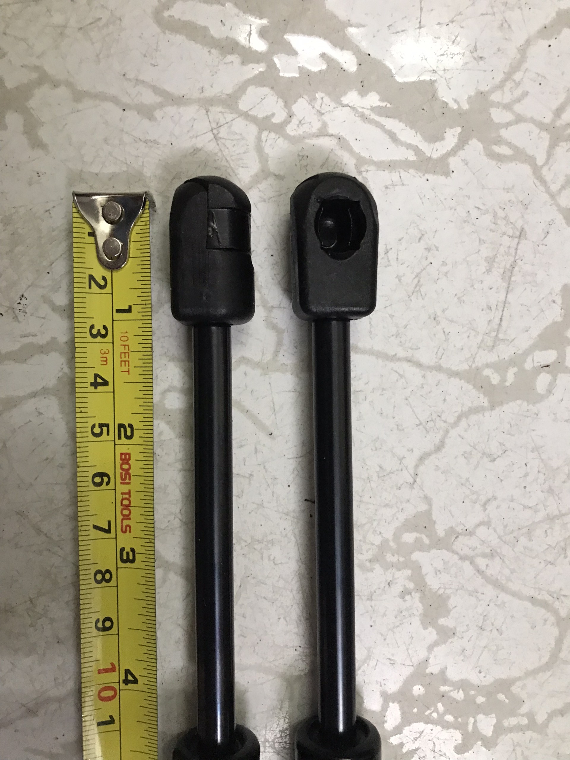 Ty chống cốp sau Mazda 2