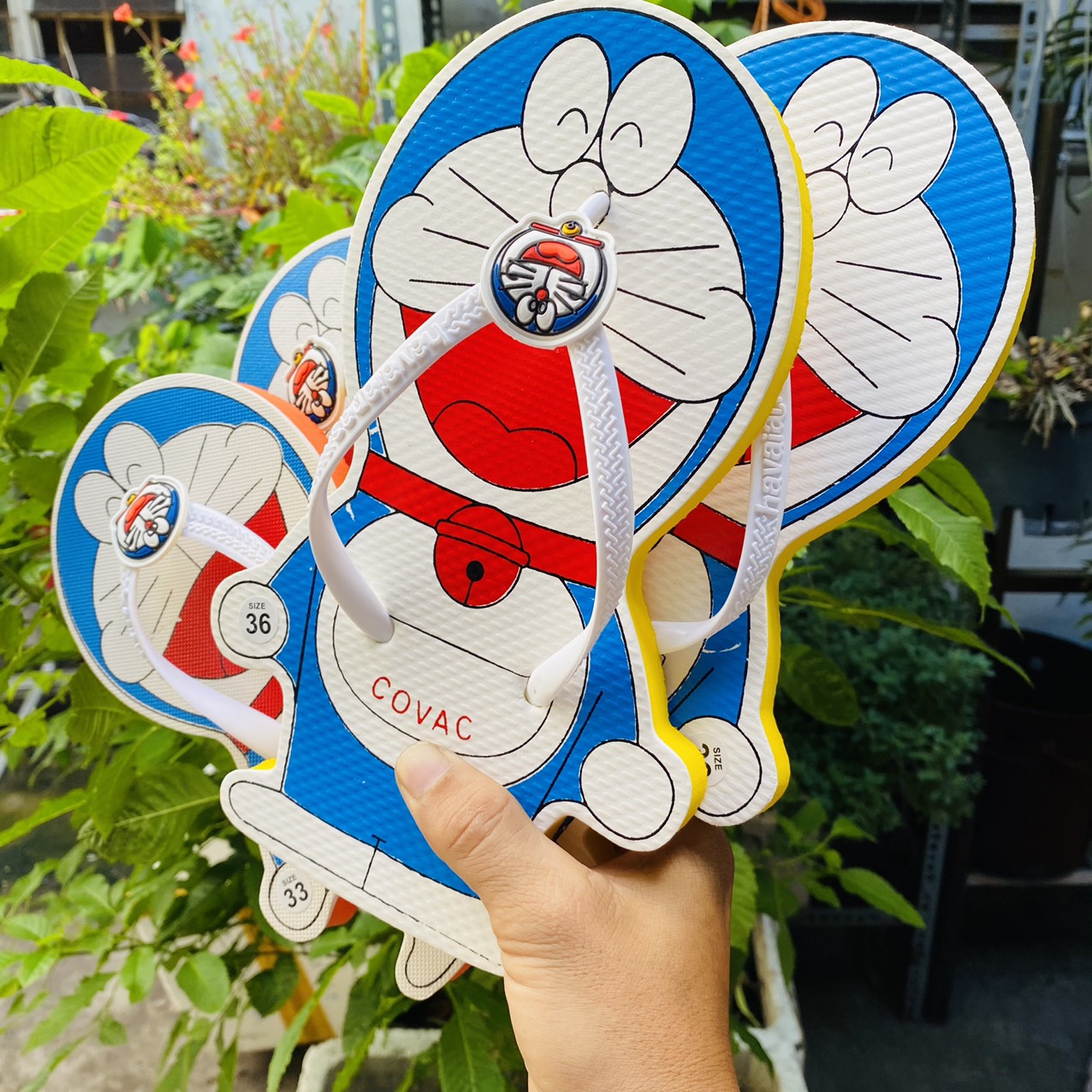 Dép nữ xỏ ngón doremon dễ thương