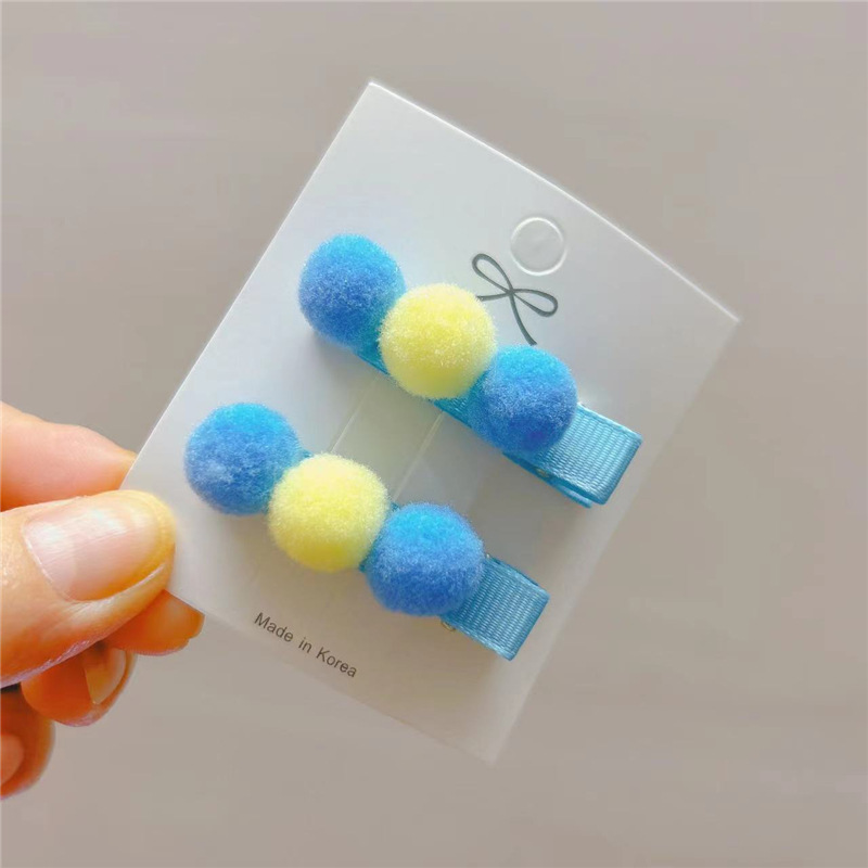 set 2 kẹp tóc pon pon cho bé .