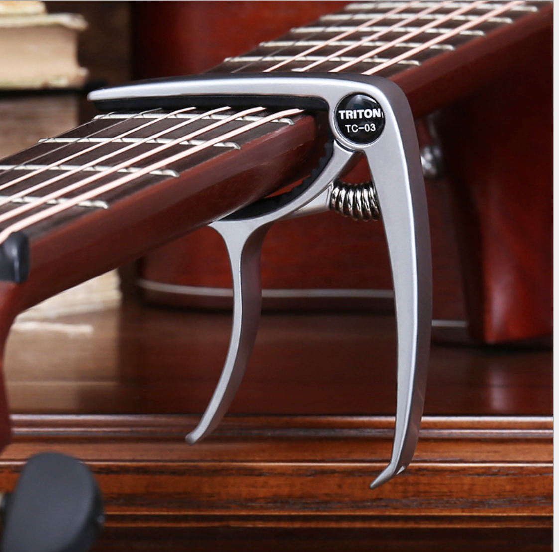Capo Đàn Guitar/Ukulele Vân Gỗ TC-03.