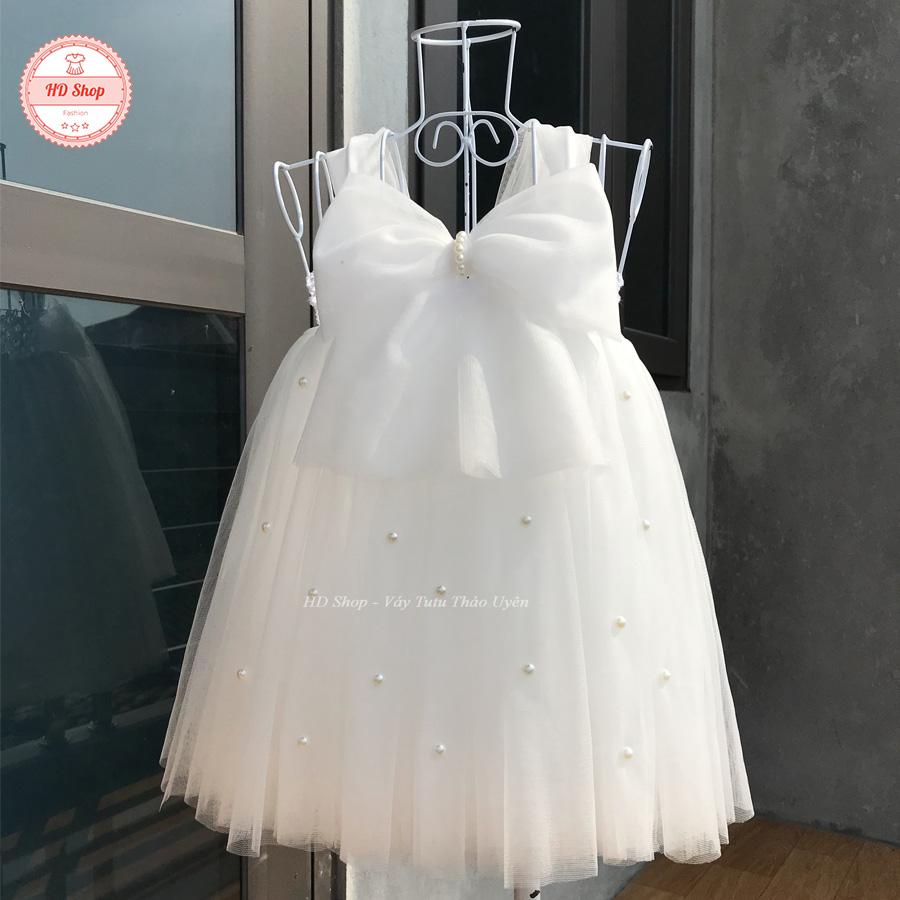 Váy thôi nôi cho bé màu trắng nơ đính đá
