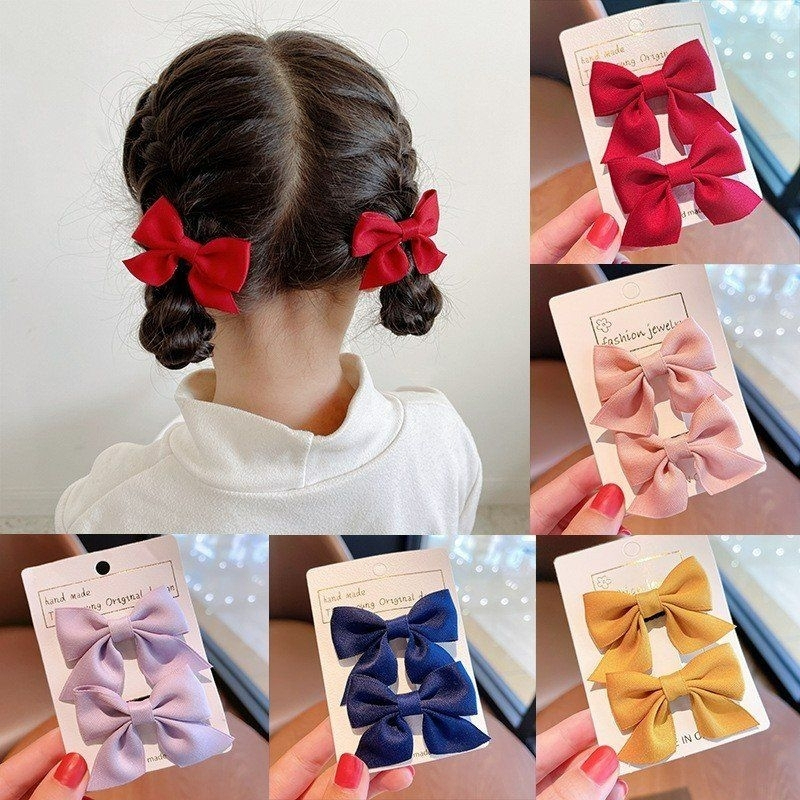 Set 2 kẹp tóc nơ màu trơn xinh xắn cho bé đáng yêu
