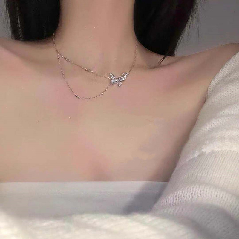 Vòng cổ bướm xinh mạ bạc