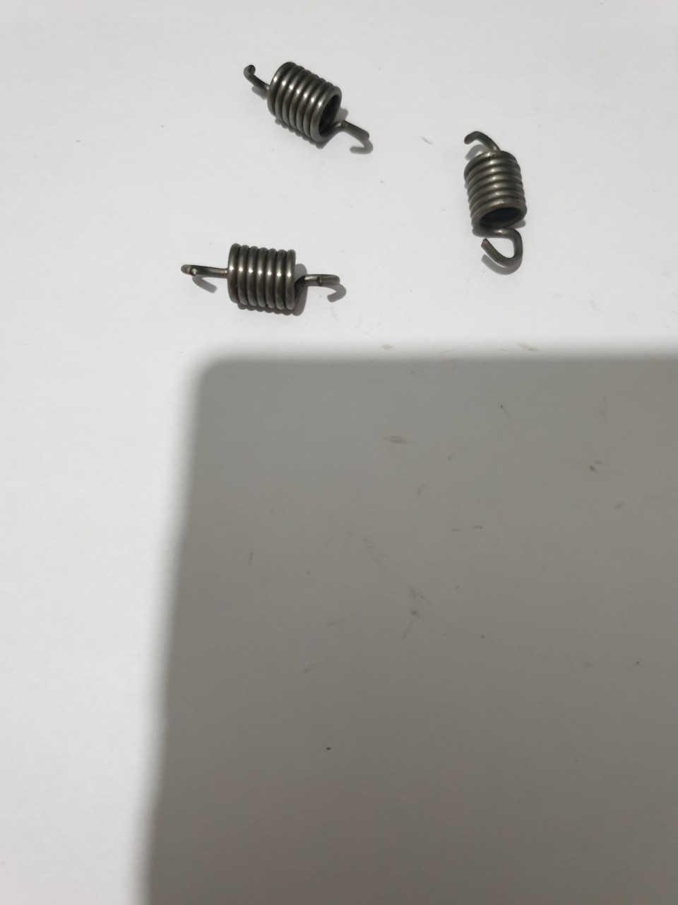 (5 CÁI) LÒ XO BỐ CÔN MÁY CƯA XÍCH MS180/250