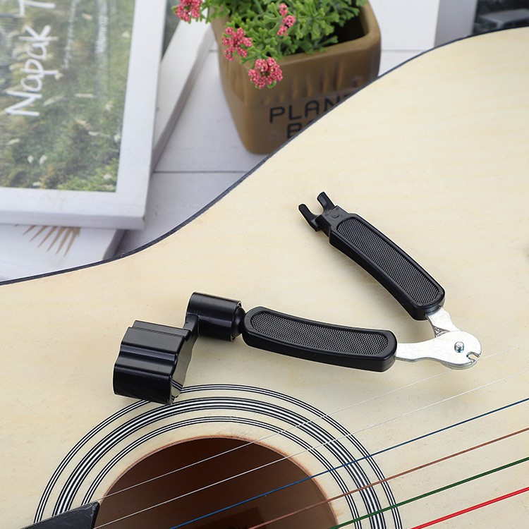 Dụng cụ thay dây đàn guitar đa năng