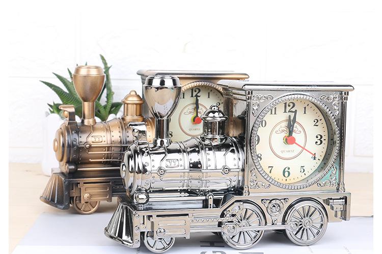 Đồng hồ để bàn hình xe, có báo thức.