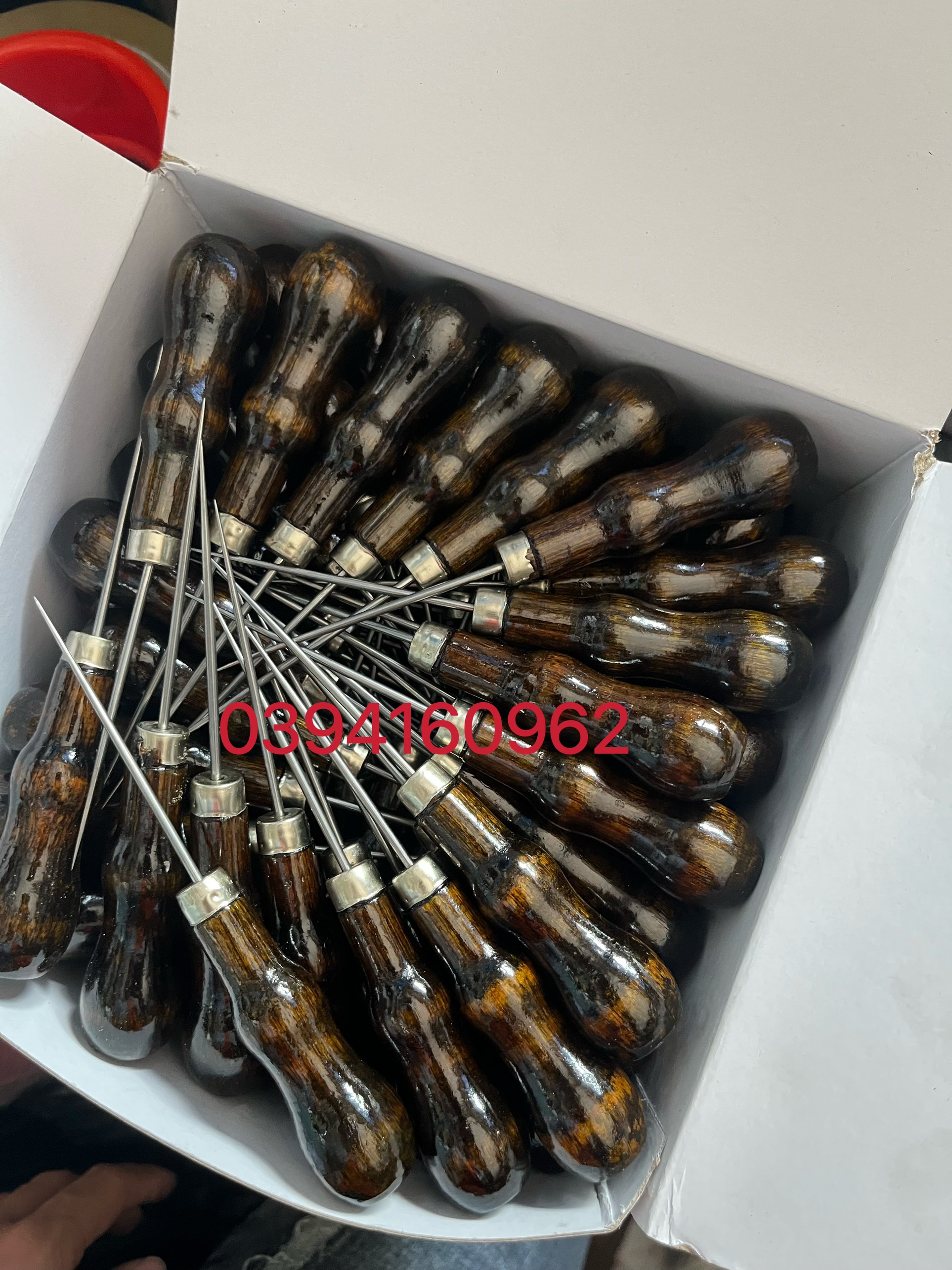 Dùi vải cán gỗ
