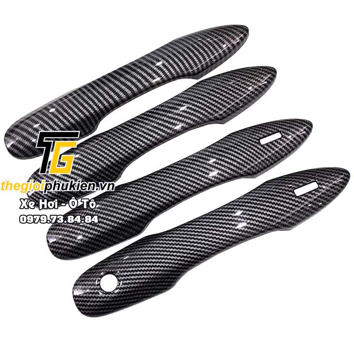 Bộ ốp tay nắm cửa xe Toyota Corolla Cross vân Carbon - Tặng miếng dán trong suốt chống xước hõm cửa