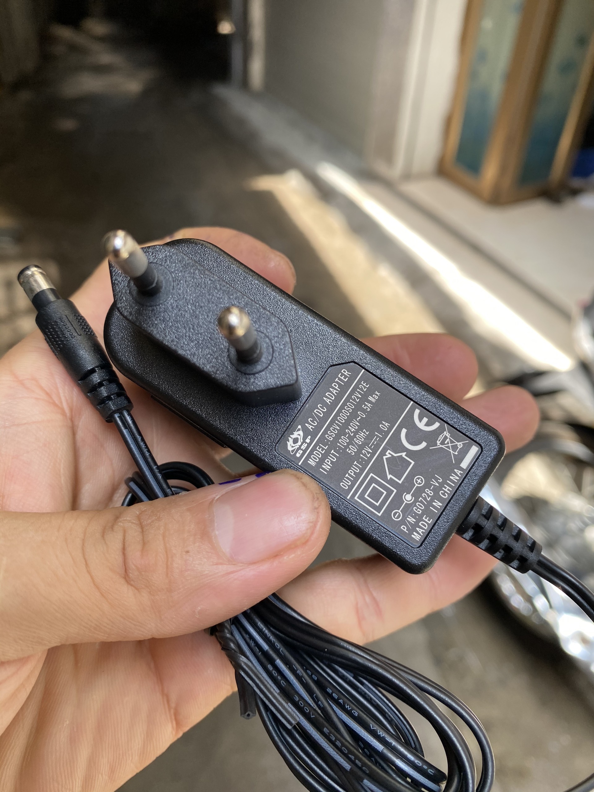 Cục nguồn 12V-1A hàng bóc thiết bị